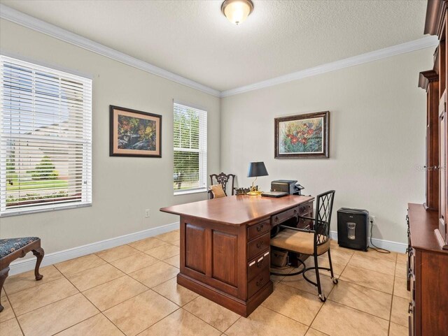 home office featuring a textured ceiling, crown molding, and light tile patterned floors