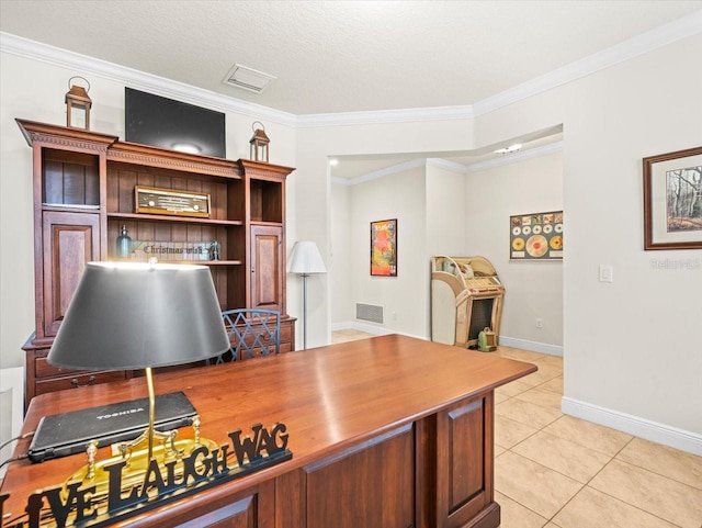 office with a textured ceiling, light tile patterned flooring, and crown molding