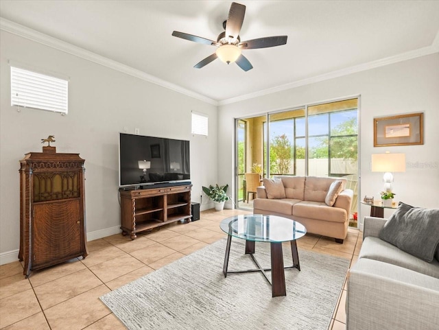 tiled living room with ceiling fan and crown molding