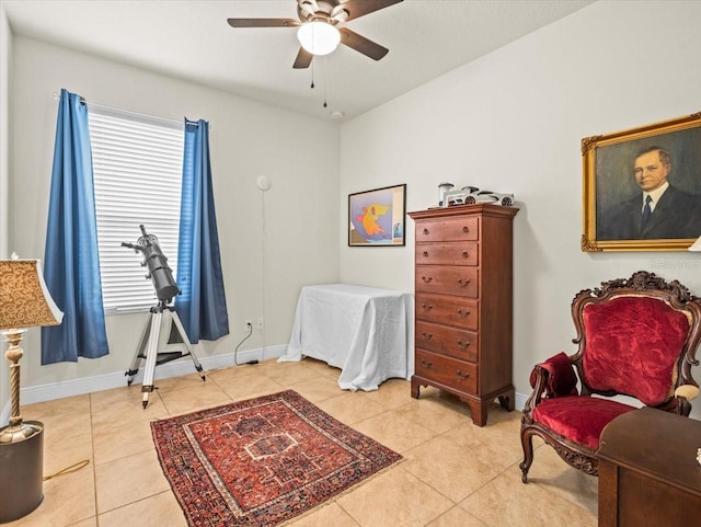 bedroom featuring ceiling fan and light tile patterned flooring