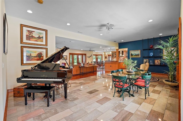 dining area with ceiling fan