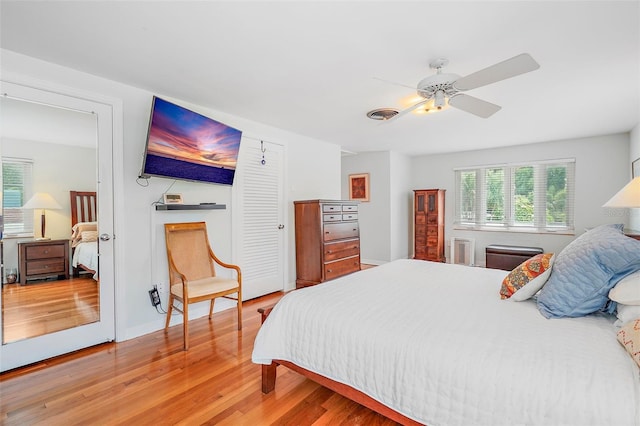 bedroom featuring ceiling fan and hardwood / wood-style floors