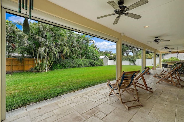 view of patio featuring ceiling fan