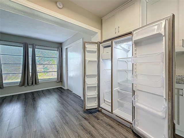 interior space with dark wood-type flooring