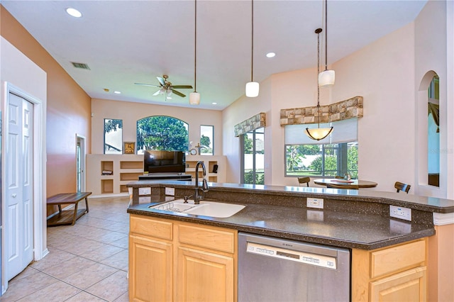 kitchen with pendant lighting, dishwasher, sink, light brown cabinets, and ceiling fan