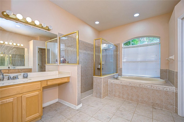 bathroom featuring vanity, separate shower and tub, and tile patterned floors