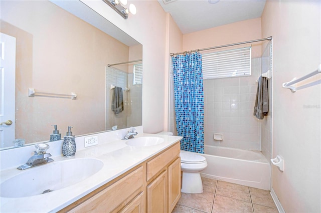 full bathroom with shower / bath combination with curtain, tile patterned floors, vanity, and toilet