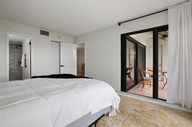 bedroom featuring a closet and tile patterned floors