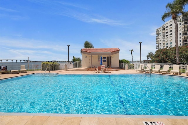 view of swimming pool featuring a patio area