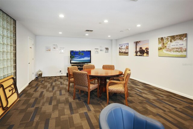 view of carpeted dining space