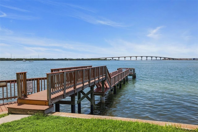 dock area featuring a water view