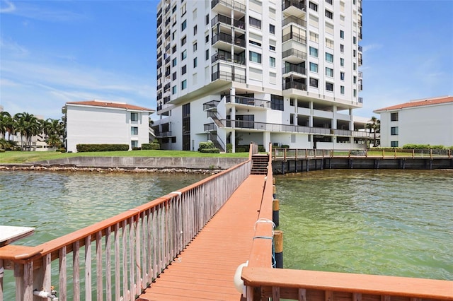 dock area with a water view