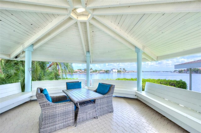 view of patio featuring a water view