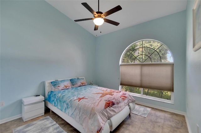 bedroom with vaulted ceiling and ceiling fan