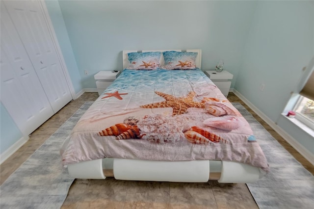 bedroom featuring hardwood / wood-style floors