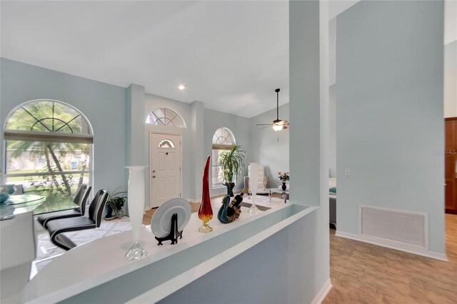 interior space featuring ceiling fan