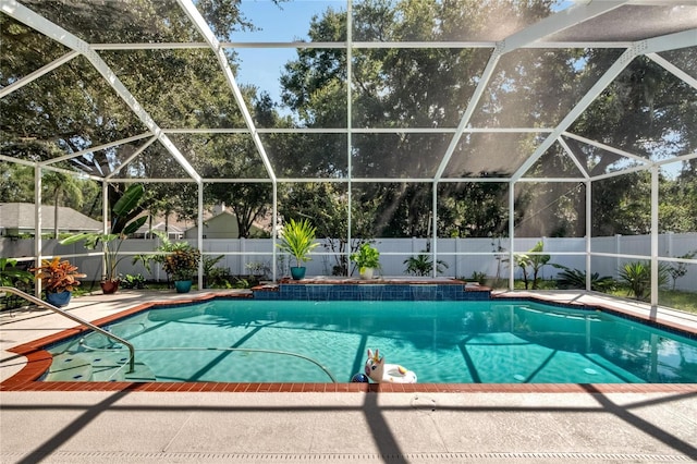 view of pool featuring a lanai