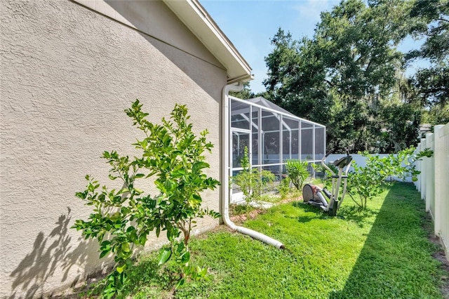 view of yard with a lanai