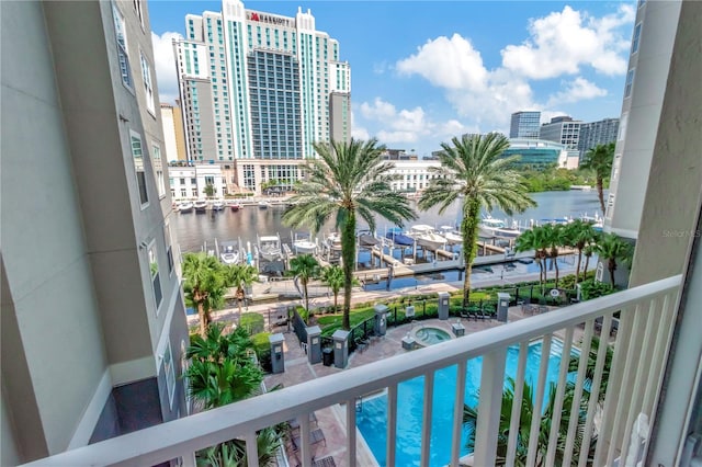 balcony featuring a water view