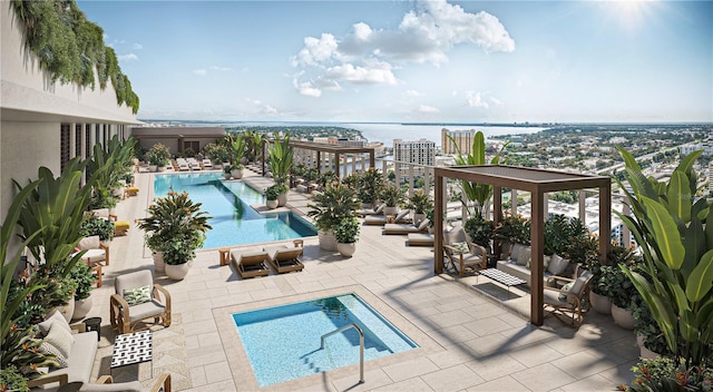 view of swimming pool with a patio and a water view