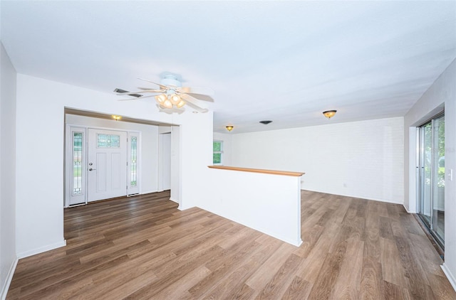 entrance foyer featuring ceiling fan and hardwood / wood-style floors