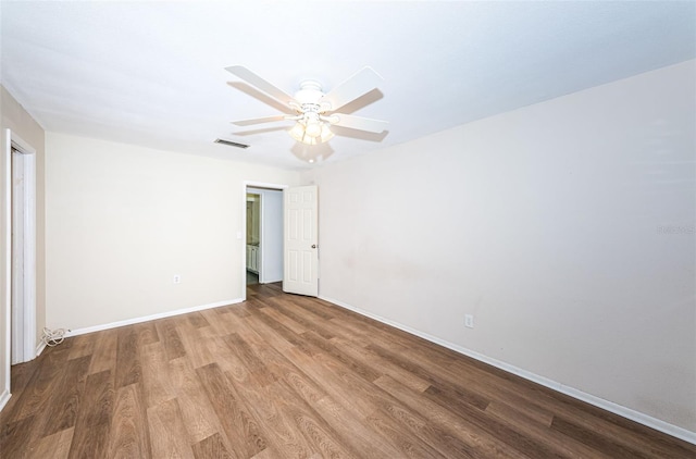 unfurnished room with wood-type flooring and ceiling fan