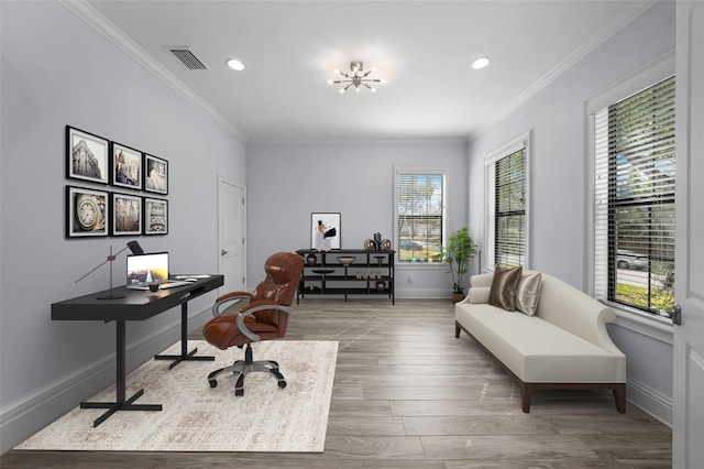 office featuring hardwood / wood-style flooring and crown molding