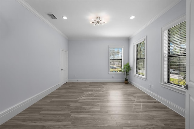 unfurnished room with dark hardwood / wood-style flooring and ornamental molding