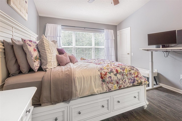 bedroom with a textured ceiling, vaulted ceiling, dark hardwood / wood-style flooring, and ceiling fan