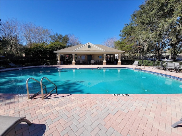 view of pool featuring a patio area