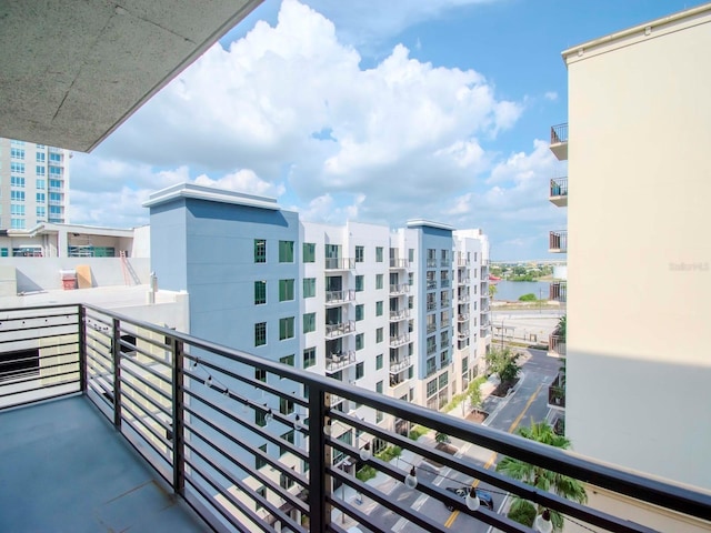 balcony featuring a water view