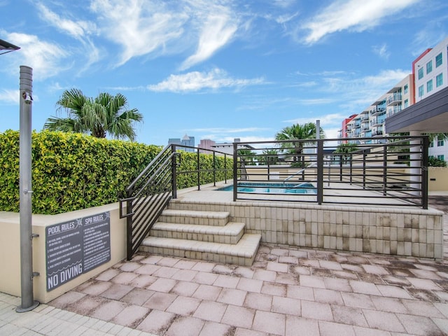 view of patio / terrace with a community pool