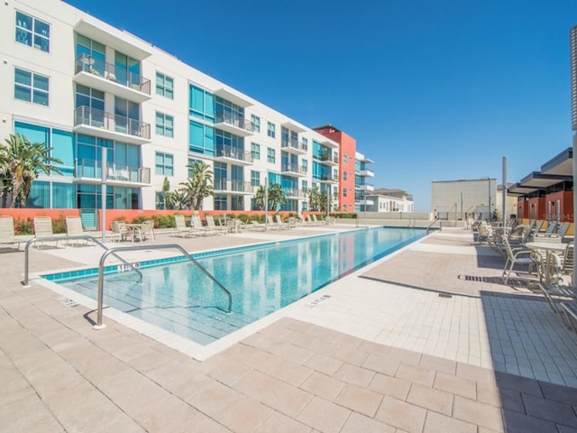 view of swimming pool with a patio area