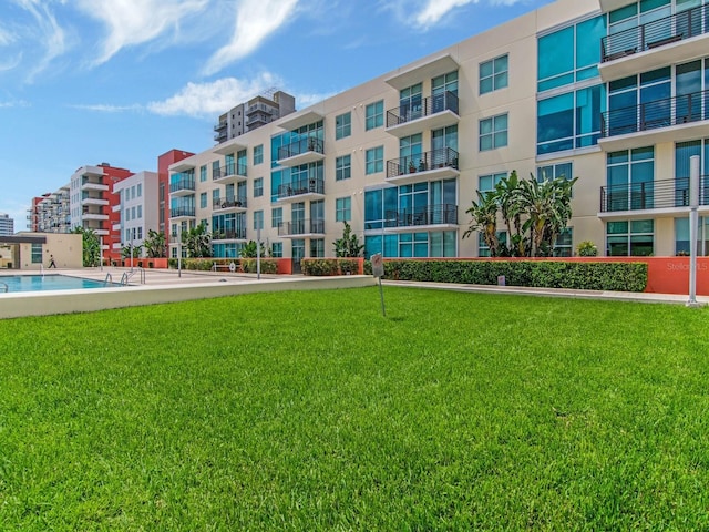 exterior space featuring a community pool