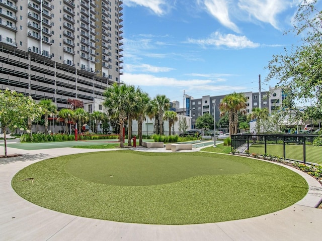 view of home's community with a lawn