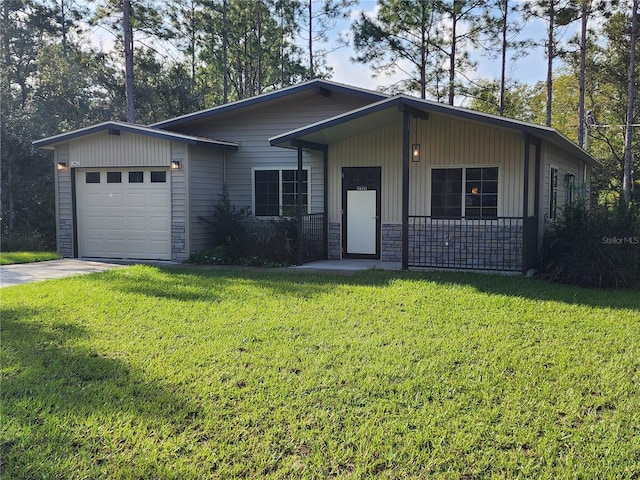 ranch-style house with a garage, a front lawn, and covered porch