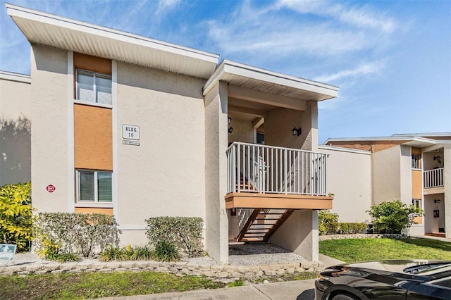 exterior space featuring stucco siding