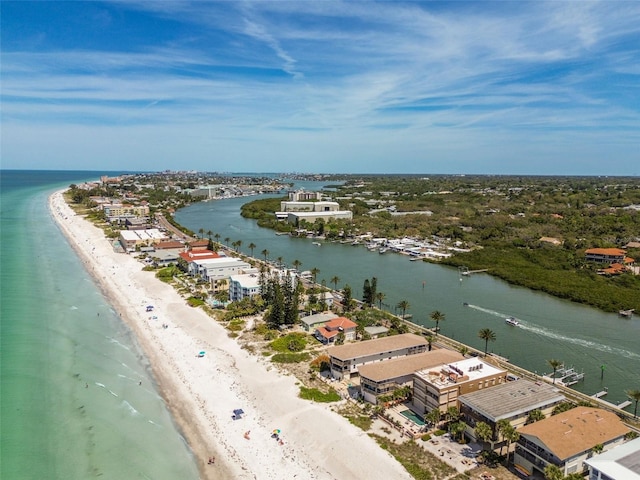 birds eye view of property featuring a view of the beach and a water view