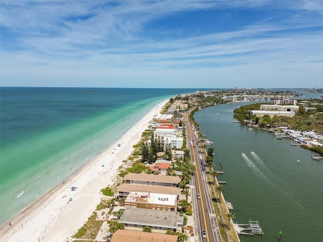 bird's eye view featuring a beach view and a water view