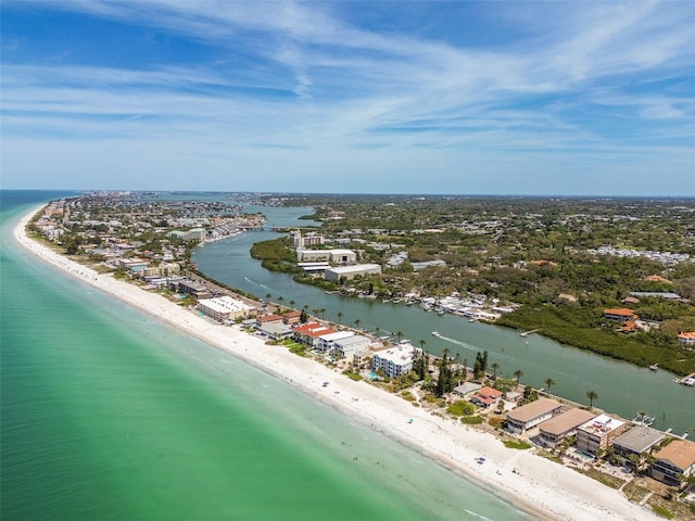 birds eye view of property with a view of the beach and a water view