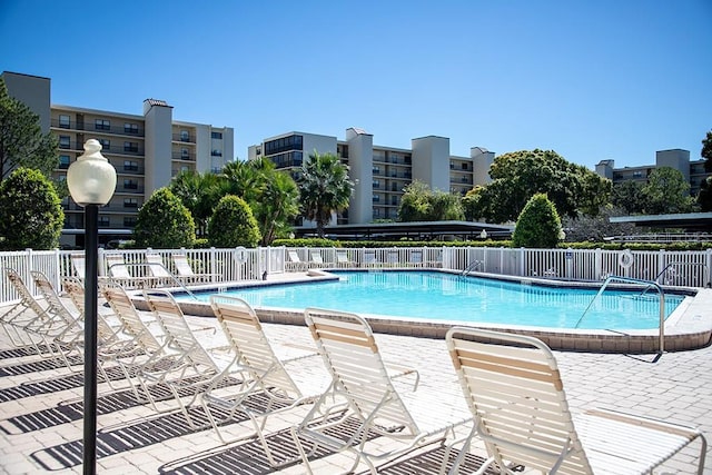 view of pool featuring a patio area