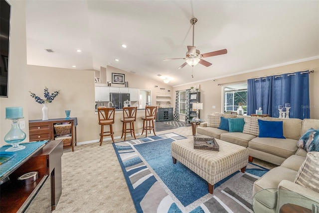 carpeted living room with lofted ceiling, crown molding, and ceiling fan