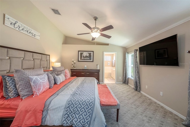 bedroom featuring lofted ceiling, ceiling fan, carpet flooring, ornamental molding, and ensuite bathroom