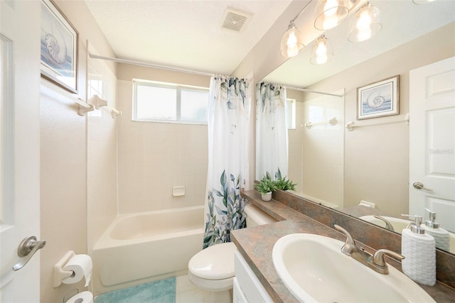 full bathroom with a textured ceiling, toilet, vanity, shower / tub combo with curtain, and tile patterned flooring