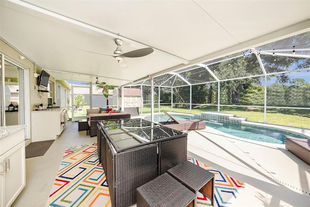 exterior space with an outdoor living space, a lanai, and ceiling fan