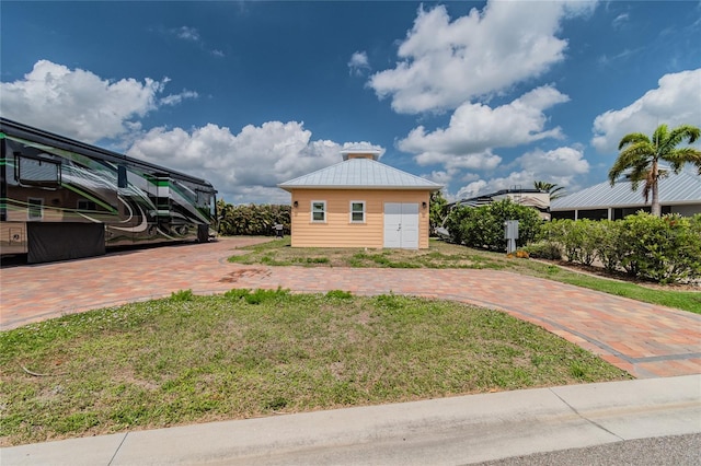 exterior space with a lawn