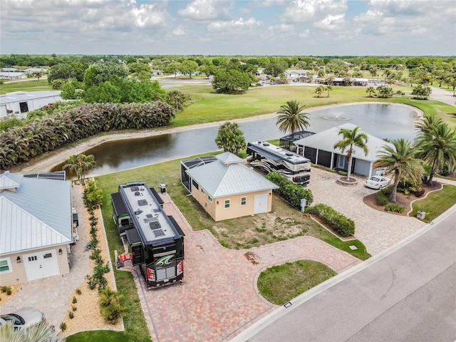 birds eye view of property featuring a water view