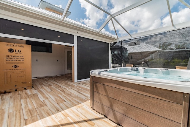 exterior space with a hot tub