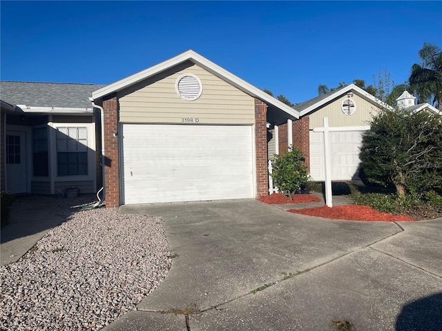 single story home with a garage