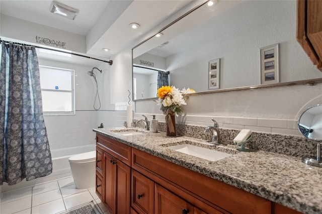 full bathroom featuring vanity, tile patterned flooring, toilet, and shower / tub combo with curtain